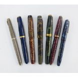 A collection of vintage fountain pens to include Parker, etc, some with 14k gold nibs (7)