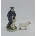 Royal Copenhagen porcelain figure of a boy with his dog, model number 782 and a Bing & Grondahl