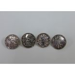 Set of four Eastern white metal buttons, stamped 800