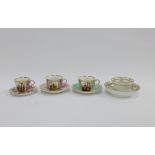 A pair of Wolfsohn style Dresden cups and saucers and a smell Dresden porcelain moustache cup and