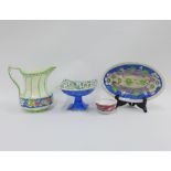 MakMerry Scottish handpainted pottery to include a jug, comport, oval dish and a small pin dish,