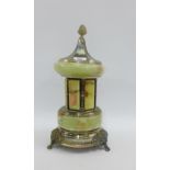 Vintage green hardstone Pagoda cigarette dispenser with musical action, 25cm high