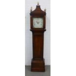 19th century oak longcase clock with a hooded top with gilt metal finials, the dial inscribed John