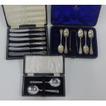Cased silver flatware sets to include a pair of Sheffield silver spoons, set of six Sheffield silver