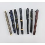 A collection of vintage fountain pens to include Waterman's and parker, etc, some with 14k gold nibs