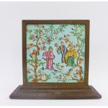 Copeland chinoiserie tile contained within a faux bronze stand, 25 x 29cm