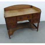 19th century mahogany ledgeback washstand, with four frieze drawers, shaped undertier and fluted