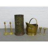 A collection of brass wares to include a coal bucket, stick stand and candlesticks, etc (a lot)