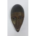Marka Tribe, Mali circumcision wooden mask with painted teeth and metal mounts, 26cm