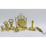 Brass wares to include a table gong, Salters No.2 Spring Balance scales, brass weights, candlestick,