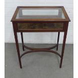 Mahogany bijouterie table with crossbanded and glazed top, raised on square tapering legs with a x
