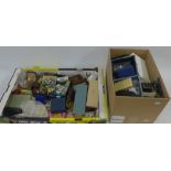 Two cartons containing a quantity of vintage and later costume jewellery, cuff links, trinket boxes,