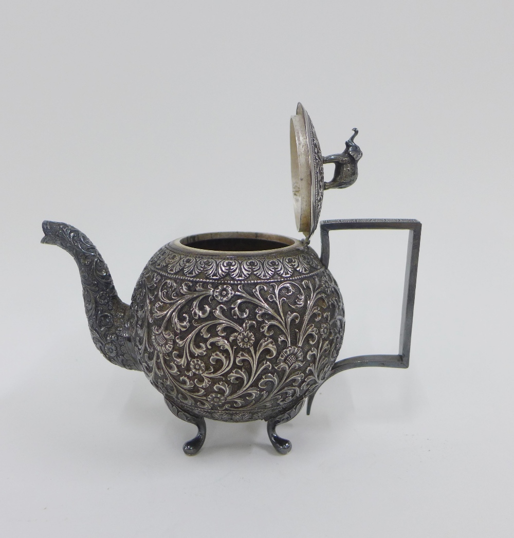 Eastern white metal teapot, the lid with an elephant finial, 12cm high - Image 2 of 2