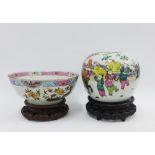 Chinese famille rose ginger jar style vase, 19cm, and a Chinese punch bowl with repairs, with two