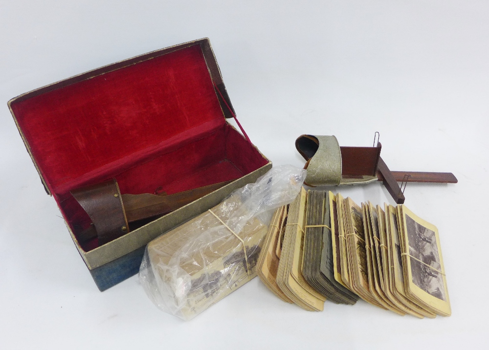 Two early 20th century stereograph viewers together with a collection of cards, scenes to include