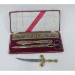 Emil Olsson, Sweden, cased set containing a damascened and niello ruler, paper knife and scissors