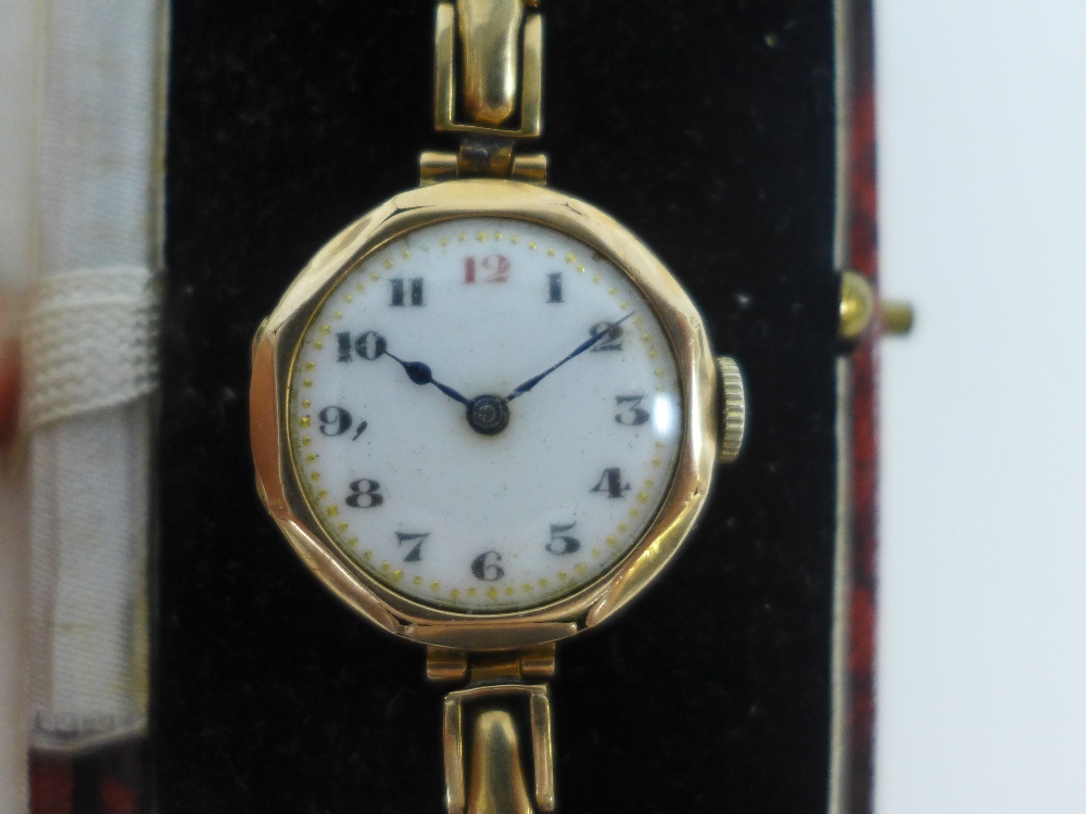 Two early 20th century 9ct gold brooches and a lady's vintage 9ct gold cased wristwatch on a 9ct - Image 2 of 4