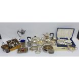 Collection of Epns wares to include a three piece teaset, claret jug, inkwell, salts, flatwares, etc