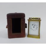 French brass and glass panelled carriage clock, with leather carry case, and key, 15cm high