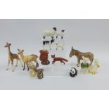 Collection of various Beswick animals to include a giraffe, donkey, deer, squirrel, duck, panda