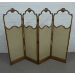 Four fold screen with foliate carved toprails, glazed panels missing, 145 x 45cm per panel