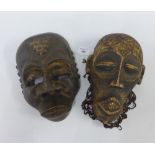 Two African wooden masks to include Gabon and Chokwe (Mwana Pno) with string detail to the back,