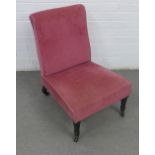 Pink upholstered bedroom chair on ebonised legs with brass caps and ceramic castors, 49 x 71 x 43cm