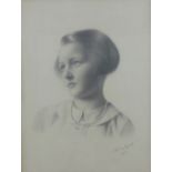 Two early 20th century head and shoulder portrait drawings of a young girl, signed indistinctly