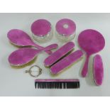 George V silver and pink guilloche enamel dressing table brush set, Birmingham 1922, comprising a