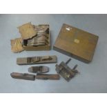 Vintage woodworking planes, cutlery canteen box and a quantity of undecorated wooden shield wall