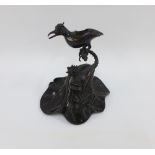 Bronze koro modelled as a bird perched on a rugged stem, 16cm