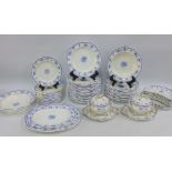 Mintons dinner service, white glazed with blue border and floral garland pattern, (approx 57)