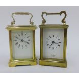 Two brass and glass panelled carriage clocks to include the London Clock company, etc (2)