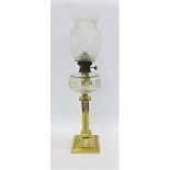 Brass oil lamp with etched glass shade, size overall including funnel 75cm