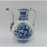 Chinese blue and white porcelain wine vessel with a dragon pattern, 23cm high