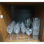 Suite of early 20th century etched glass stemware and five beakers, two wine glasses of similar