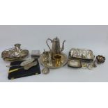 A collection of Epns wares to include a salver, coffee pot, servings dishes, beakers, Elkington & Co