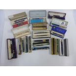 A collection of early 20th century boxed fountain pens, etc, to include Swan, Onoto and parker,