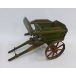Vintage green painted wooden 'Pickford & Co' miniature cart, 53cm long
