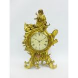 Rococo style brass cased mantle clock, the back plate inscribed Dent, London, 49cm high