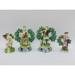 Collection of Staffordshire bocage pottery figures to include a pair of male and female