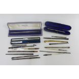A collection of fountain pen nib holders to include silver, white metal, yellow metal and shell, etc