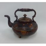 19th century treacle glazed pottery kettle, spout a/f, 25cm