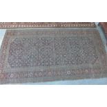 Large North West Persian rug, faded blue field with allover foliate design, 385 x 202cm