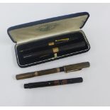 Waterman fountain pens and pencil all with 9ct gold bands (4)