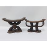 Pair of South African wooden neckrests, largest 26 x 17cm (2)