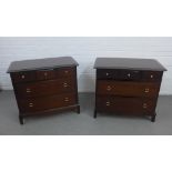 a pair of Stag Minstrel bedroom chest, each with three short and two long drawers, 82 x 70 x 45cm (