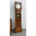 Oak cased grandmother clock with a silver dial and Arabic numerals, 180cm high