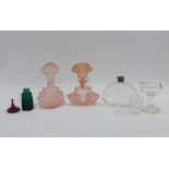 Pink glass scent bottle and stopper, marked to the base Czechoslovakia, another of similar design,