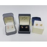 Two pairs of 18ct gold stud earrings and a pair of 9ct gold gemset earrings (3)